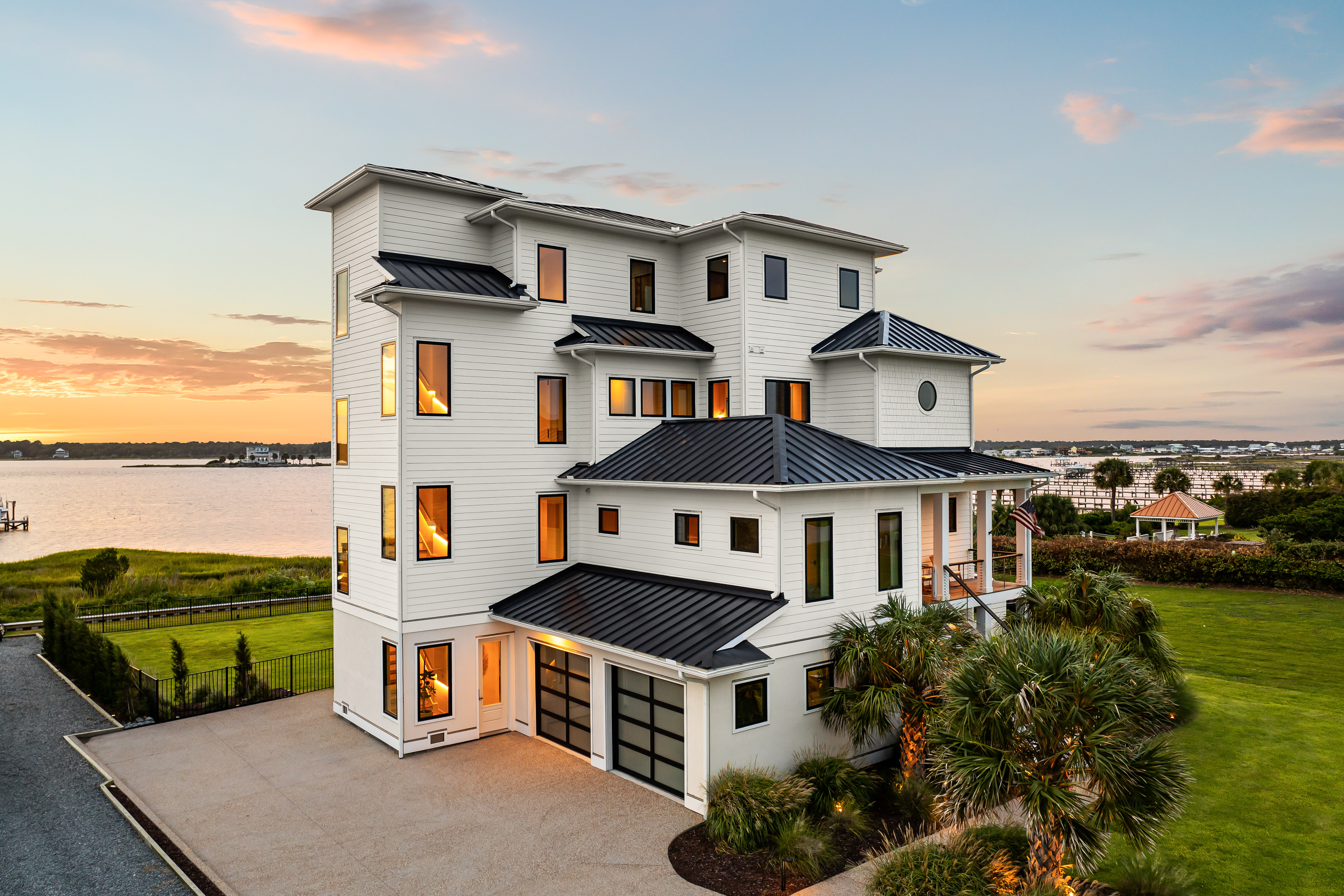 23 Sailview illuminated at dusk along the waterfront